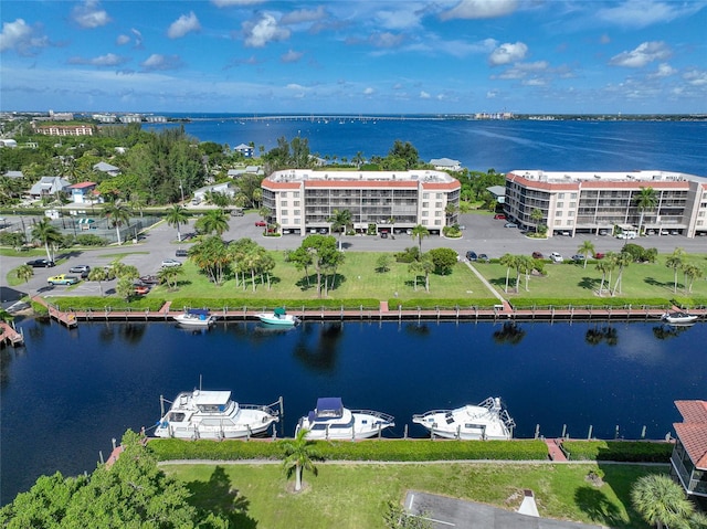 birds eye view of property featuring a water view