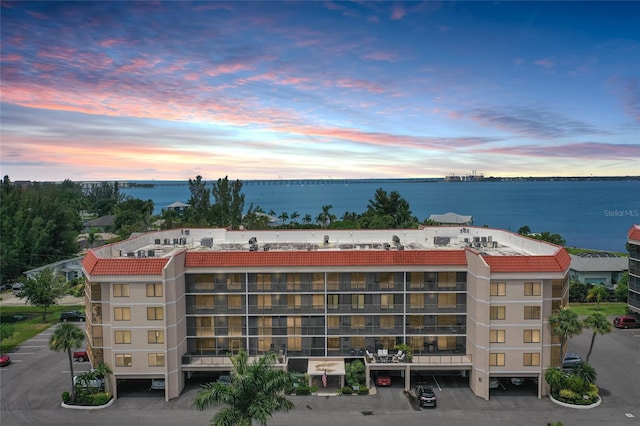 outdoor building at dusk with a water view