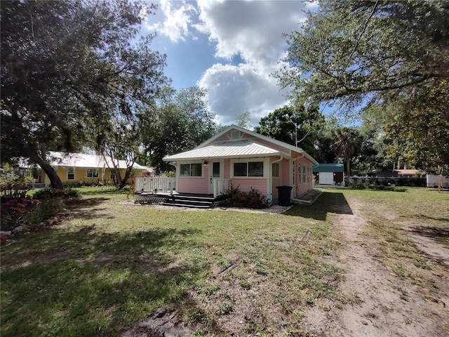 exterior space featuring a front lawn