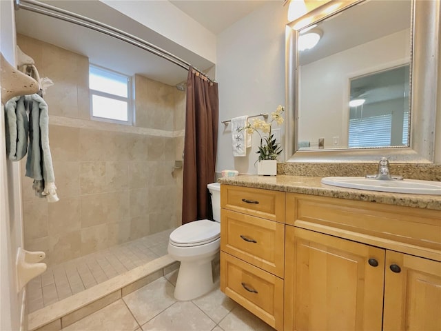 bathroom featuring vanity, tile patterned floors, curtained shower, and toilet