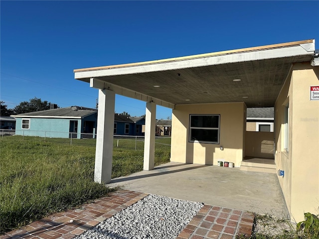 view of patio featuring a carport