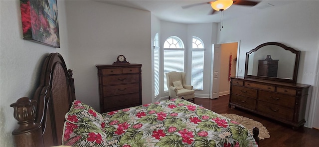 bedroom featuring dark wood-type flooring and ceiling fan