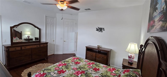 bedroom featuring dark hardwood / wood-style floors and ceiling fan