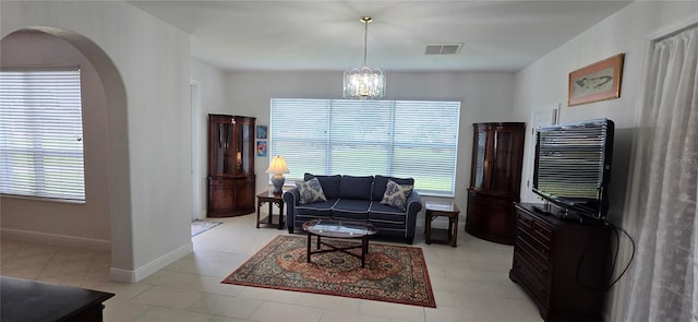 living room with a chandelier