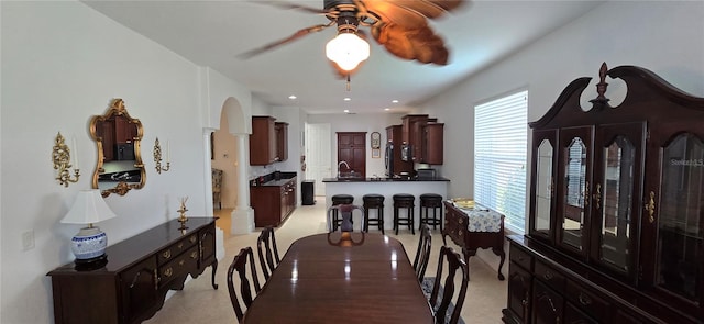 dining room featuring light colored carpet