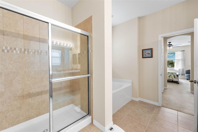 bathroom featuring ceiling fan, separate shower and tub, and tile patterned flooring