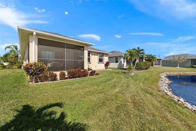 view of yard featuring a sunroom