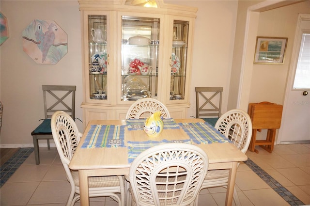 view of tiled dining space