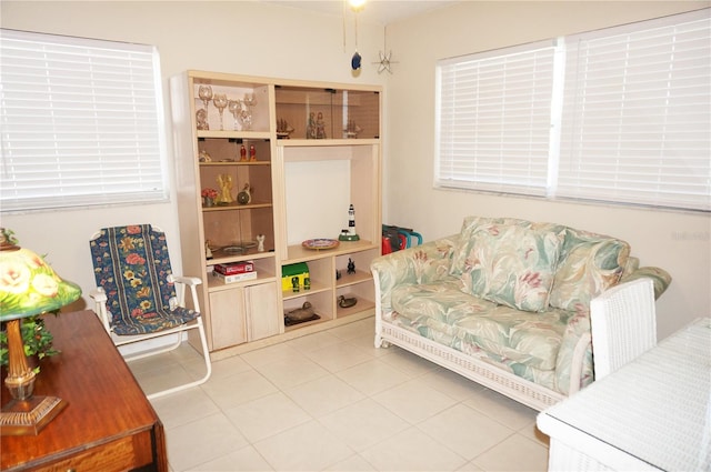 sitting room with tile patterned flooring