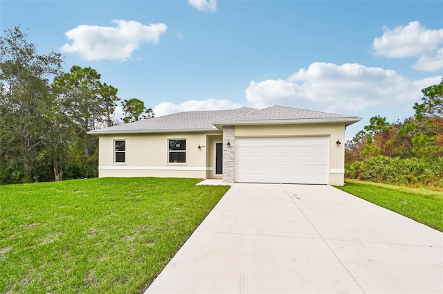 view of front of home featuring a front lawn and a garage