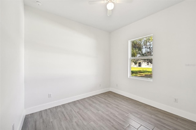 unfurnished room with light hardwood / wood-style floors and ceiling fan