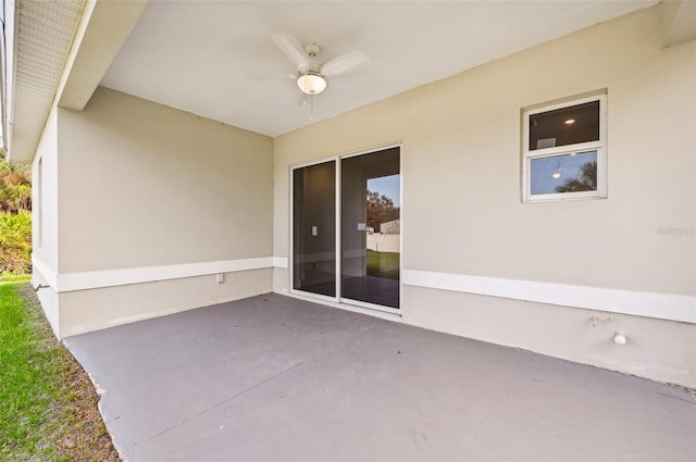 view of patio featuring ceiling fan