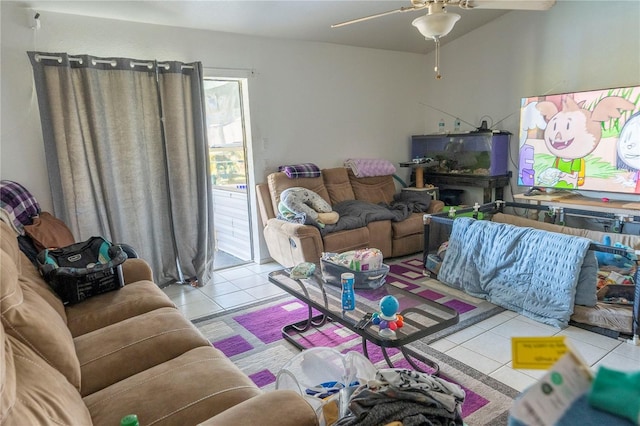 living room featuring ceiling fan and light tile patterned floors