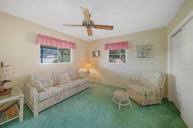 living room with carpet, a healthy amount of sunlight, and ceiling fan