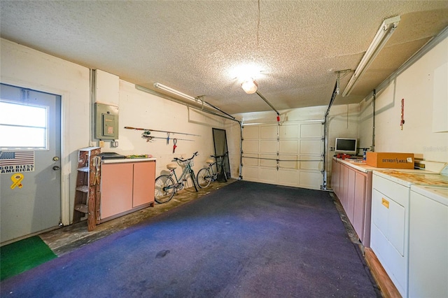 garage with washer and dryer