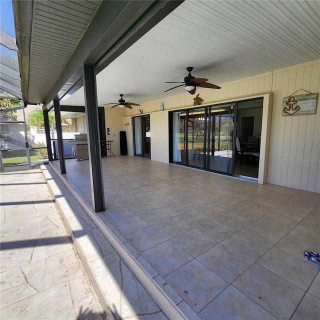 view of patio featuring ceiling fan