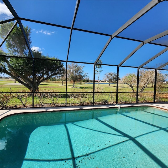 view of pool featuring a lanai