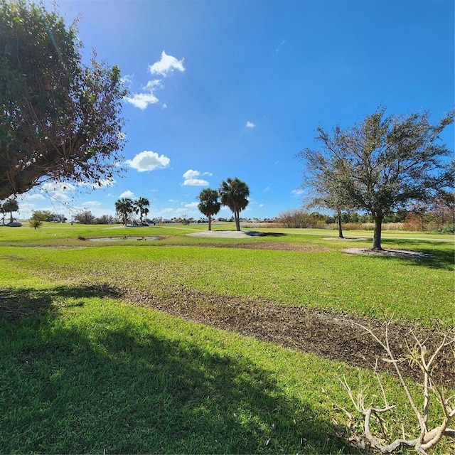 view of yard with a rural view