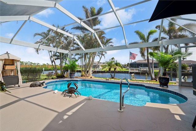 view of pool featuring a water view, a patio, and glass enclosure