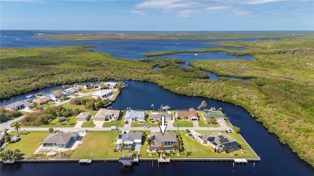 drone / aerial view with a water view