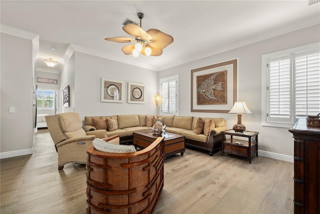 living room with ceiling fan, ornamental molding, a healthy amount of sunlight, and light hardwood / wood-style flooring