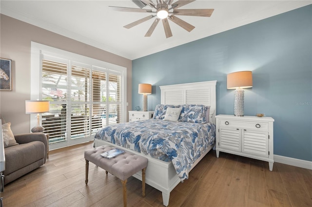 bedroom with ceiling fan and hardwood / wood-style floors