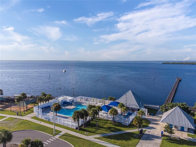 birds eye view of property with a water view