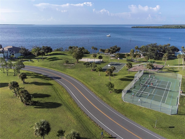 birds eye view of property with a water view