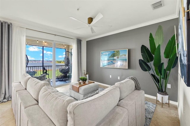 living room with crown molding, a water view, light tile patterned floors, and ceiling fan