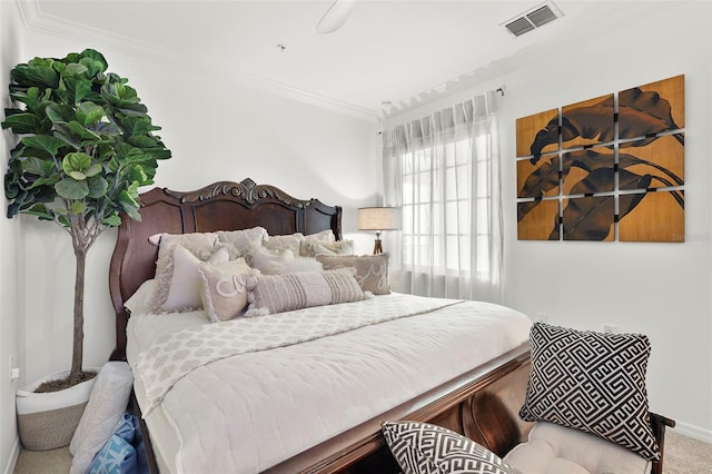 carpeted bedroom with ornamental molding