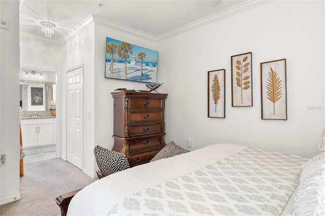 bedroom with connected bathroom, light carpet, and crown molding