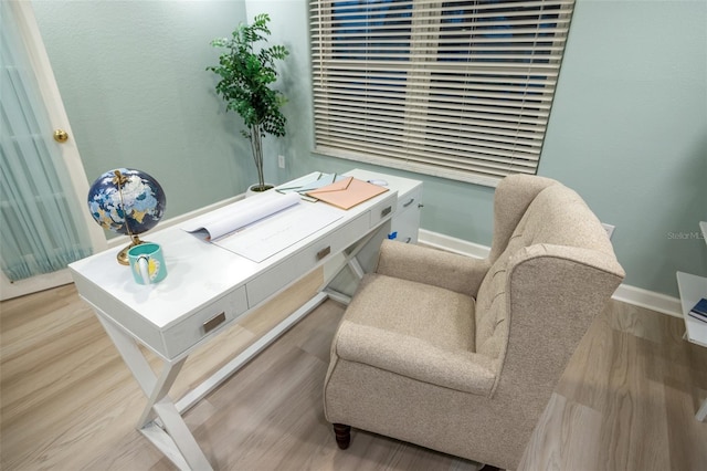 home office with light wood-type flooring