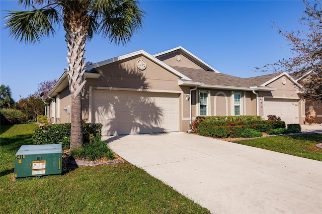 ranch-style home featuring a garage and a front lawn