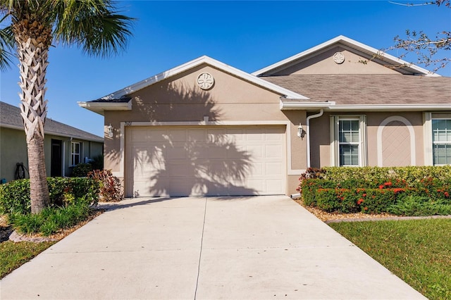 ranch-style home with a garage