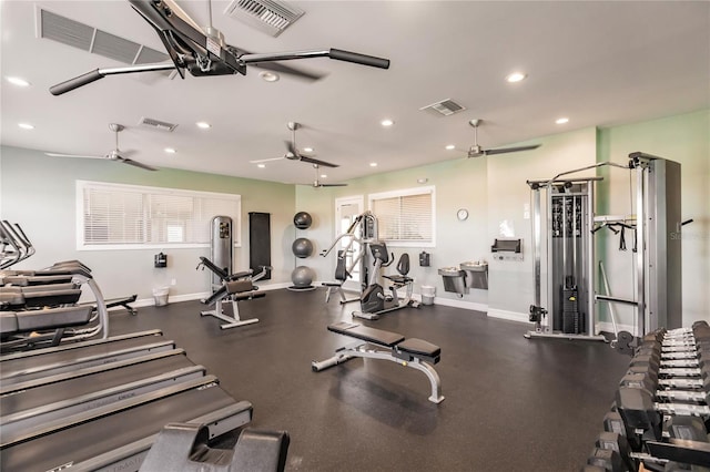 workout area featuring ceiling fan