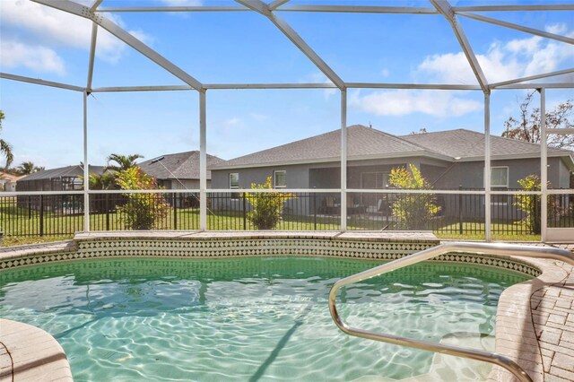 2262 Rio De Janeiro Ave, Punta Gorda, FL 33983 - view of pool featuring a fenced backyard and glass enclosure