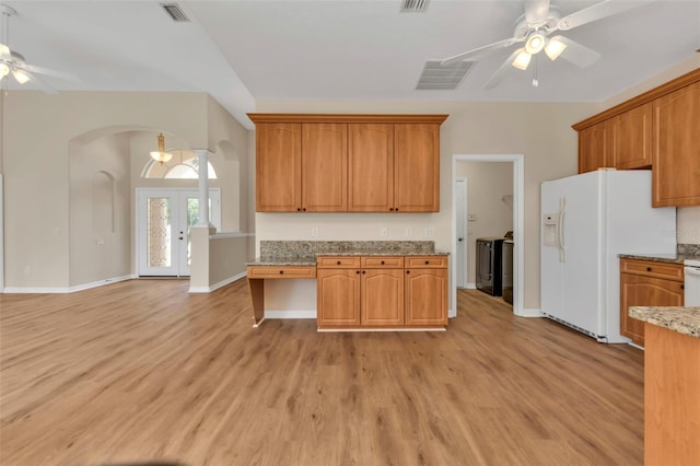 kitchen with ceiling fan, french doors, light stone counters, white refrigerator with ice dispenser, and light wood-type flooring