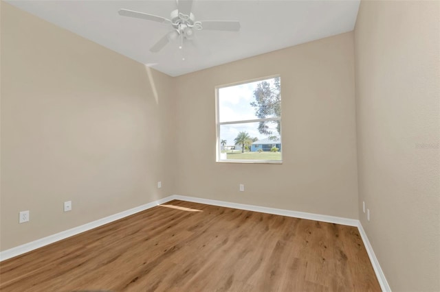 2262 Rio De Janeiro Ave, Punta Gorda, FL 33983 - empty room featuring baseboards, light wood-style floors, and ceiling fan