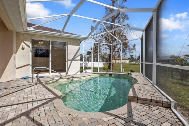 2262 Rio De Janeiro Ave, Punta Gorda, FL 33983 - outdoor pool featuring a patio and a lanai