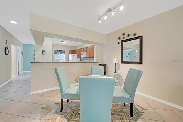 view of tiled dining space