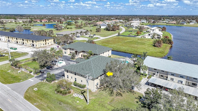 drone / aerial view with a water view