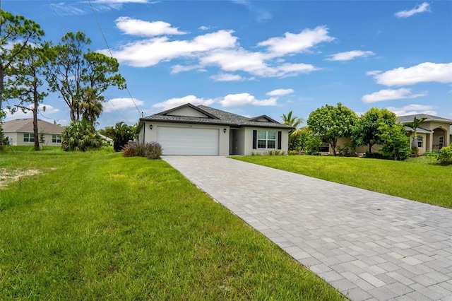 ranch-style home with a front yard and a garage