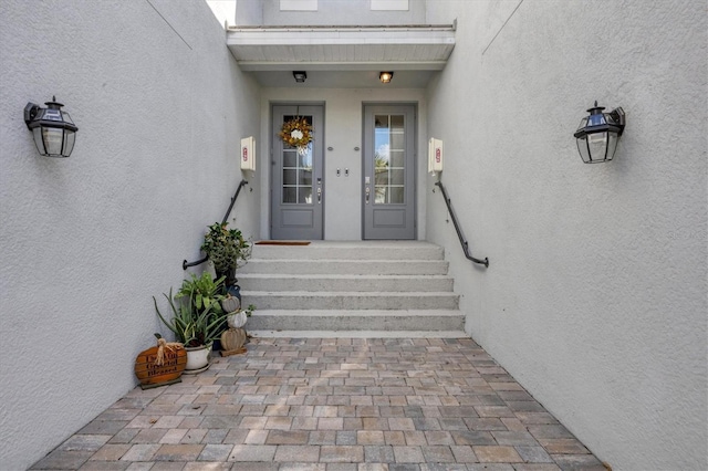 14640 Sycamore Ct Unit 2822, Punta Gorda, FL 33955 - view of exterior entry featuring stucco siding