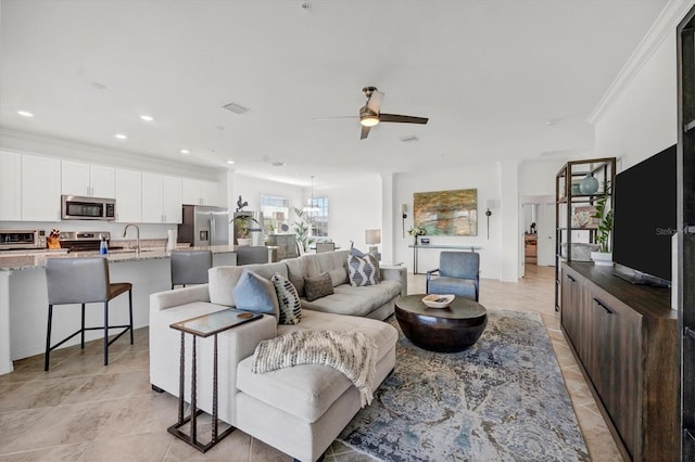 14640 Sycamore Ct Unit 2822, Punta Gorda, FL 33955 - living area with a ceiling fan, crown molding, and recessed lighting