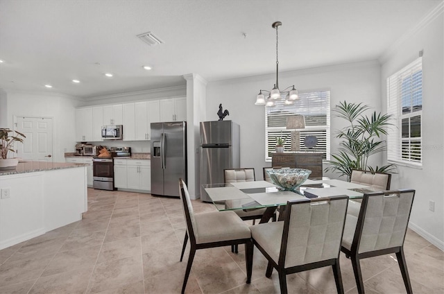 14640 Sycamore Ct Unit 2822, Punta Gorda, FL 33955 - dining space featuring ornamental molding, a chandelier, recessed lighting, light tile patterned floors, and baseboards