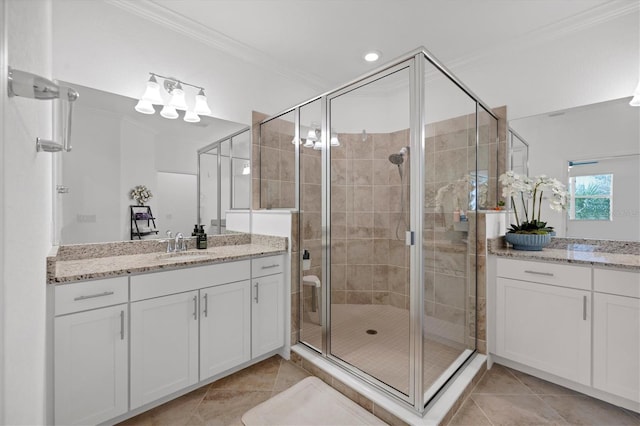 14640 Sycamore Ct Unit 2822, Punta Gorda, FL 33955 - bathroom with a shower stall, crown molding, tile patterned floors, vanity, and recessed lighting