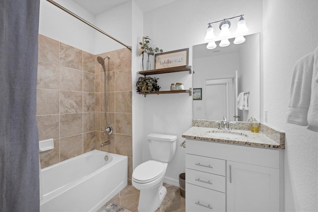 full bathroom featuring shower / tub combo with curtain, vanity, toilet, and tile patterned floors