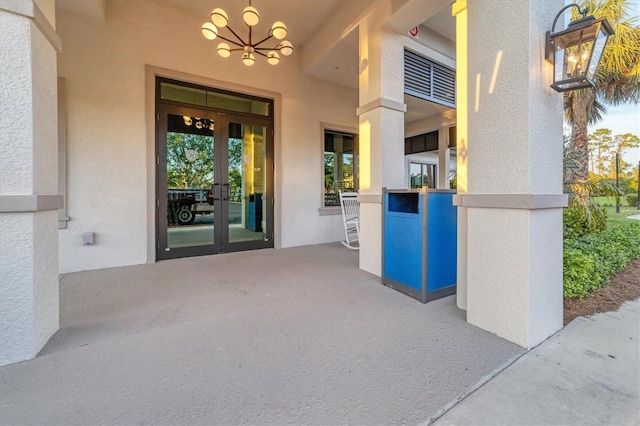 entrance to property featuring french doors