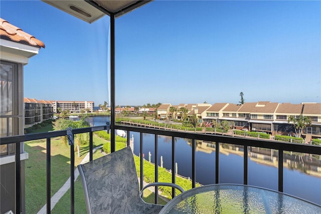 balcony featuring a water view