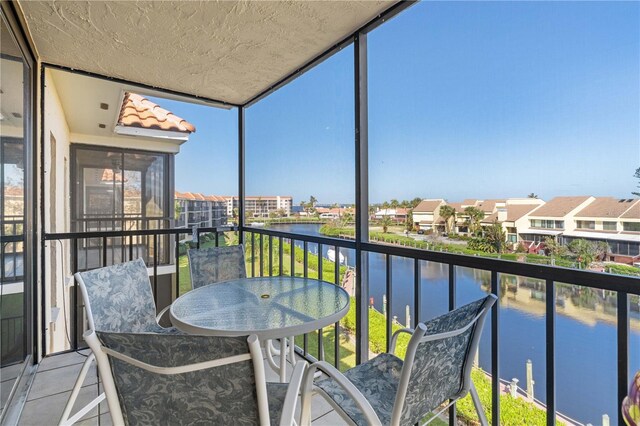 25188 Marion Ave Unit B304, Punta Gorda, FL 33950 - balcony with a water view and a residential view